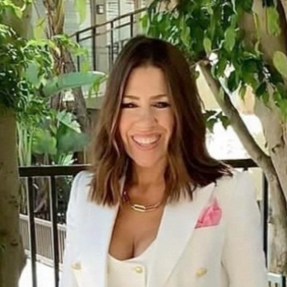 Portrait of Valerie S of Lux Custom Suits, a VIRE invited speaker